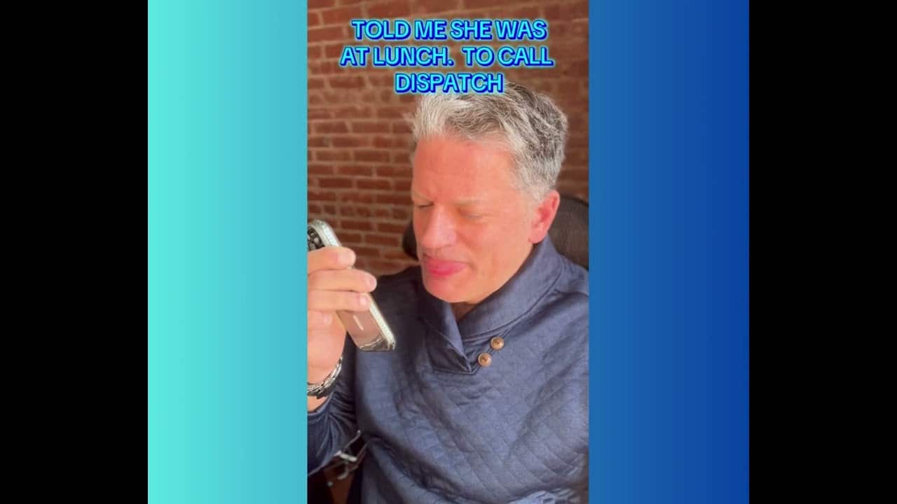 A man holding a cell phone up to his ear.