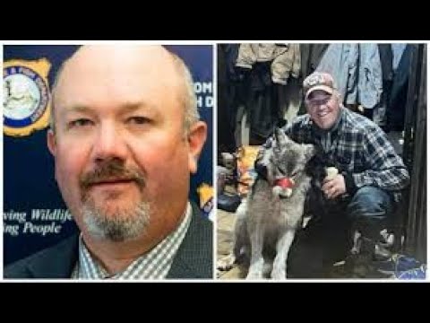 A man with a beard and mustache next to a picture of a dog.