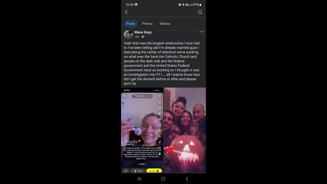A group of people are taking a picture on the phone.